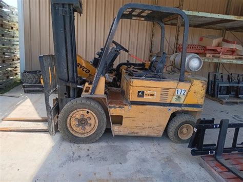 Thematic photo of a Caterpillar V50D forklift operating in an industrial setting.