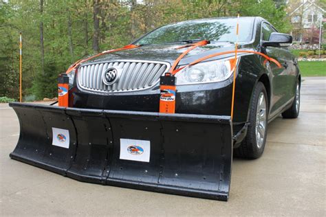 Diagram showing mounting options for a snow plow on a car frame