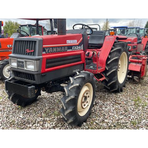 Photo showing the factory hydraulic outputs on a Yanmar FX 235 or similar model