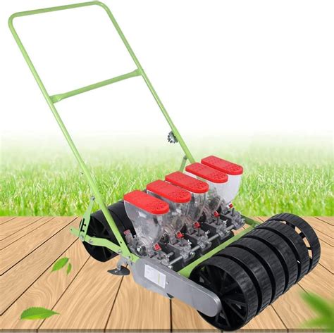 Photo of a push-type wheeled seeder for lawns