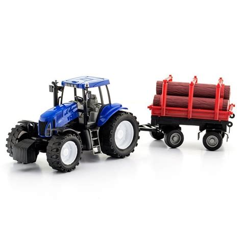 Zbliżenie na zabawkowy traktor z napędem frykcyjnym i doczepioną zgrabiarkę