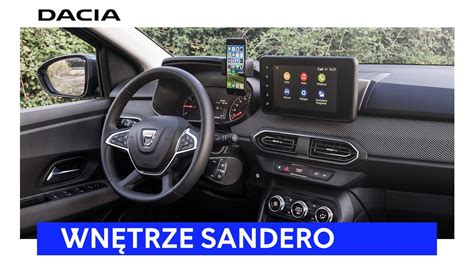 Wnętrze Dacii Sandero Stepway z widocznym ekranem multimedialnym i punktami YouClip