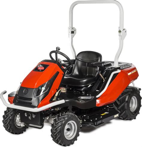 The Cedrus Goliat 4x4 110cm brush cutter tractor in action on uneven terrain, clearing high grass and small bushes.
