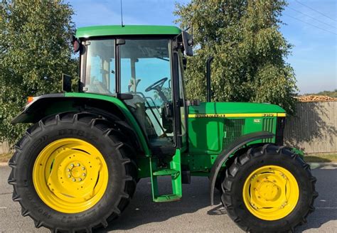 The John Deere 6310 tractor in a field setting
