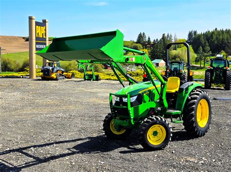 Table comparing the costs of new and used compact tractors.