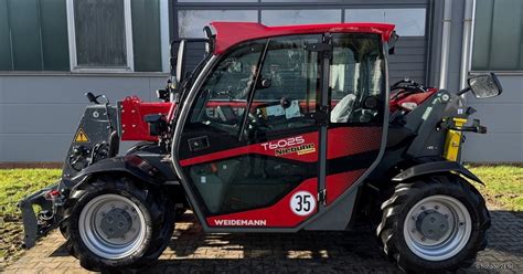 Infografika przedstawiająca cechy komfortowej kabiny operatora Weidemann T6025