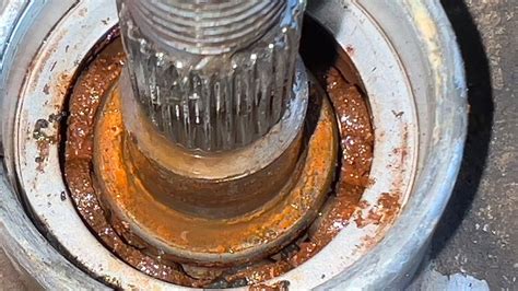 Photo showing a rusted bearing on a spreader shaft