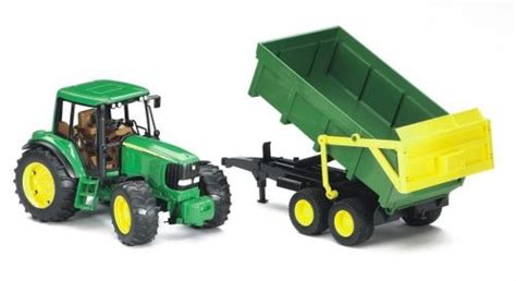 Toy model of a John Deere 6920 tractor with a dump trailer