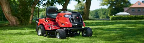Thematic photo of an MTD lawn tractor working in a garden