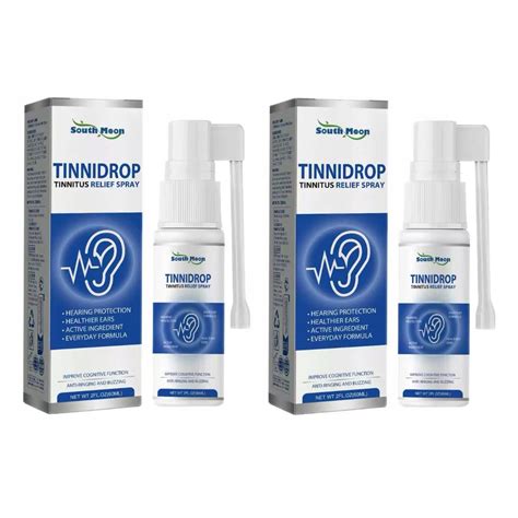 Zbliżenie na pędzelki uszne i bokobrody rysia rudego