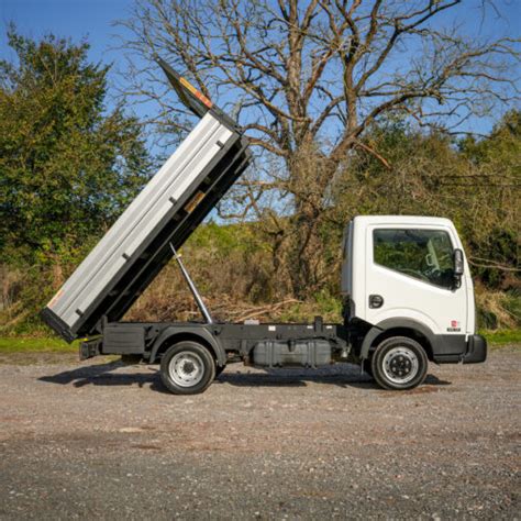 Thematic photo of Nissan Cabstar tipper truck in an outdoor setting