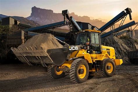 Thematic photo of a modern JCB wheel loader in action