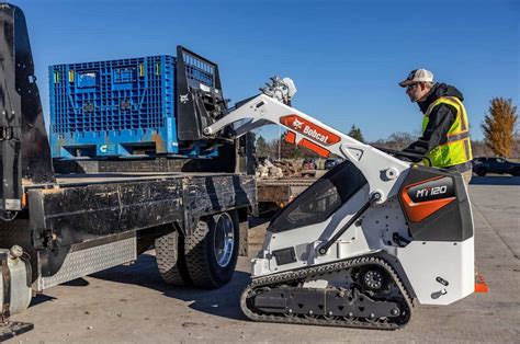 Thematic photo of a Bobcat mini loader undergoing maintenance or repair in a service workshop