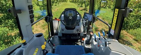 Interior of the New Holland T4F S tractor cabin, highlighting spaciousness