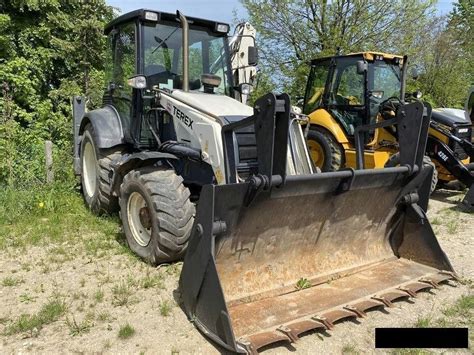 zdjęcie operatora Łukasza Kaźmierczaka przy koparkoładowarce Terex 860SX