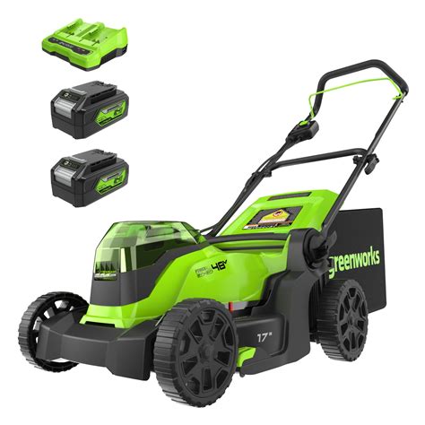 Thematic photo of a cordless lawnmower in a green garden