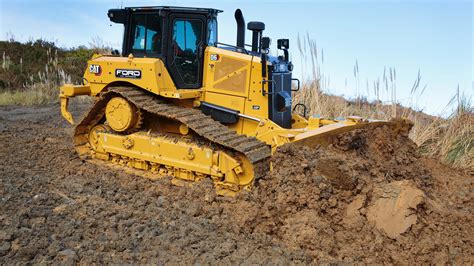 Photo of a heavy-duty tracked construction tractor, possibly a bulldozer or track loader