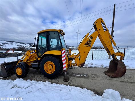 laweta transportująca koparko-ładowarkę JCB 3CX