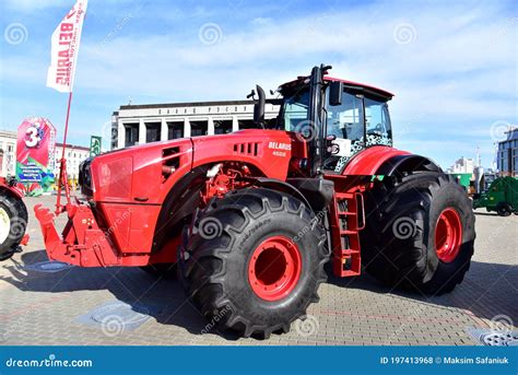 The Belarus 4522 tractor on display at an agricultural fair, highlighting its powerful presence and modern design