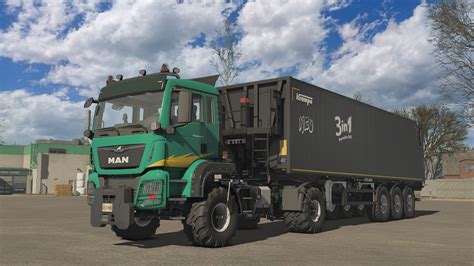 Zdjęcie ciągnika MAN AS 325A i współczesnego MAN TGS 18.500 4x4