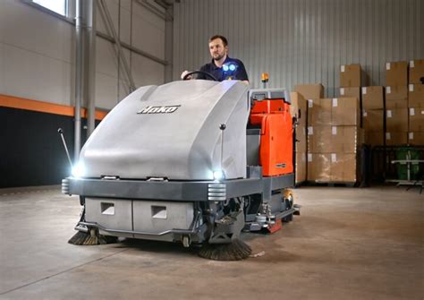 Thematic photo of a Hako industrial sweeper in action in a warehouse
