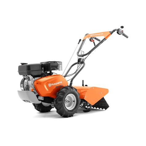 Thematic photo of a petrol tiller (e.g. Husqvarna) in action