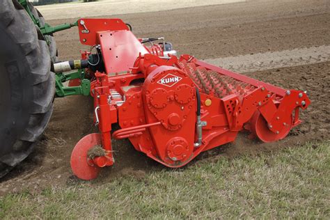 Photo of a large agricultural tiller (e.g. Kuhn EL122) at work