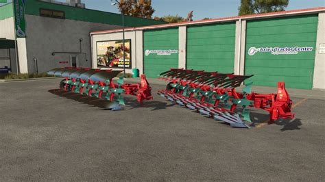 Zdjęcie Kverneland 2500 i-Plough w akcji z widocznym systemem Isobus w kabinie ciągnika