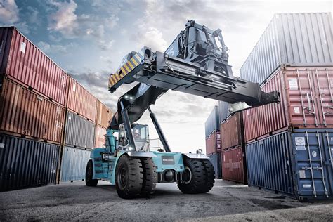 Photo of a Konecranes reachstacker operating in a port.
