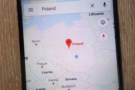 zdjęcie traktorka Murray z zaznaczoną lokalizacją akumulatora i rozrusznika