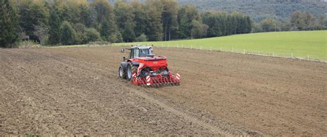 Thematic photo of modern Kuhn seeding aggregate working on a field