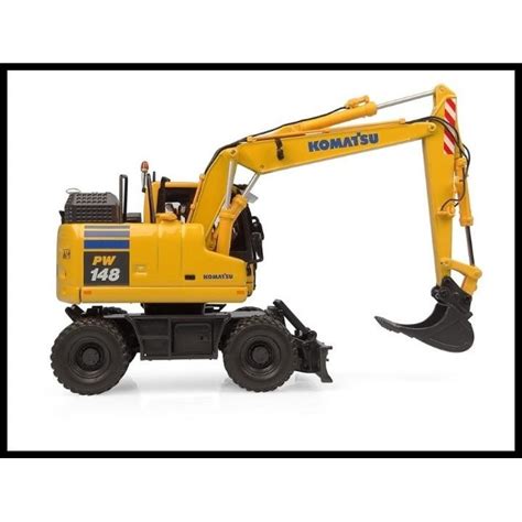 Tematyczne zdjęcie koparki kołowej Komatsu PW148 w akcji