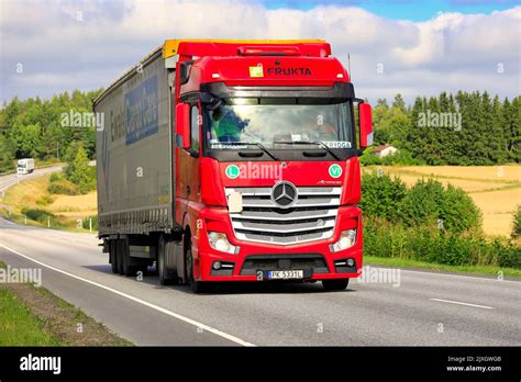 Thematic photo of Mercedes-Benz Actros driving on a highway
