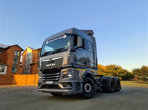 Infographics illustrating typical parameters of used MAN TGX trucks in the Świętokrzyskie region (e.g., mileage range, engine power distribution, common years)