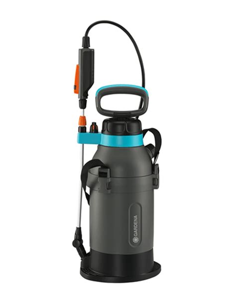 The Gardena EasyPump 5L cordless sprayer in action, being used to spray plants in a garden.