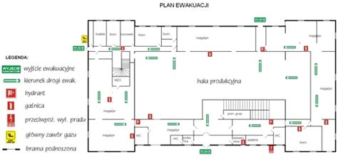Schemat placu budowy z oznaczonymi strefami bezpieczeństwa i pracującym żurawiem