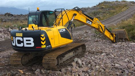 JCB JS130 excavator in action on a construction site