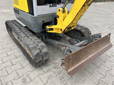 Schemat przedstawiający kluczowe podzespoły koparki (silnik, hydraulika, podwozie)