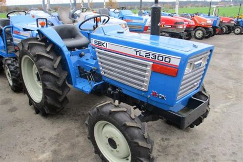 Thematic photo of an Iseki TL2300 tractor at work in a field