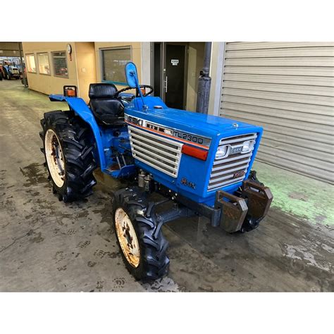 Comparison infographic of Iseki TL2300 with similar compact tractors