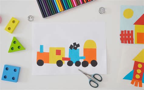 ilustracja przedstawiająca traktor zbudowany z kolorowych figur geometrycznych na kartce papieru