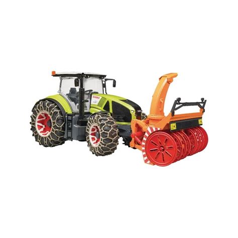 Zdjęcie przedstawiające model traktora Claas Axion 950 z zamontowaną odśnieżarką oraz łańcuchami na kołach, ukazujące detale wykonania