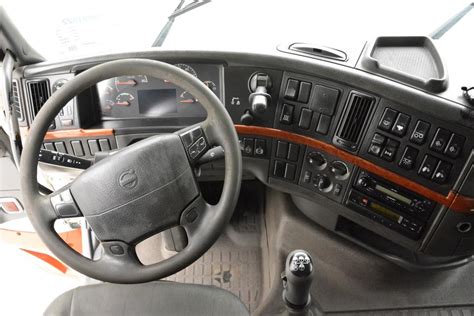 Interior of a Volvo Globetrotter XL cabin from the 2000s, showing two bunks and dashboard
