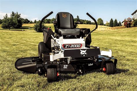 Thematic photo of a Bobcat zero-turn mower in action on a large lawn or solar farm.