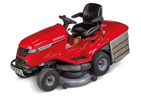 Traktorek kosiarka Honda HF 2417 HTE w ogrodzie