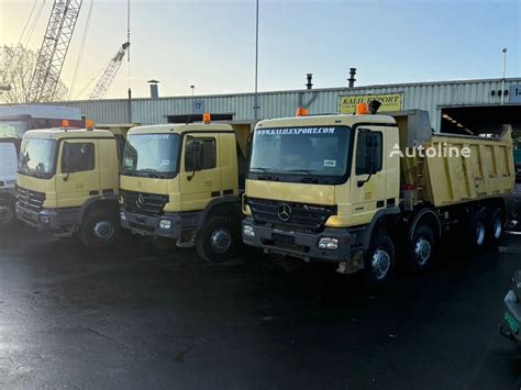 zdjęcie Mercedesa-Benza Actros 8x8 wywrotka na placu budowy