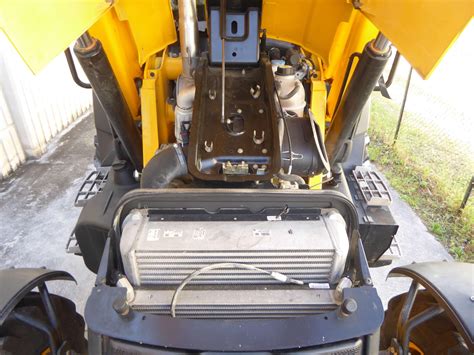 Thematic photo of a JCB machine engine compartment or drive system