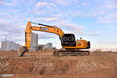 Thematic photo of a JCB JS excavator working on a construction site