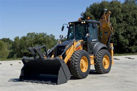 The Case 695 ST backhoe loader in action, showing both front loader and rear excavator functions.
