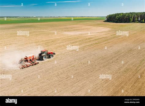 Thematic photo of a seed drill in a field at the beginning of sowing season